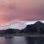 The view Wednesday from Granada Park in Phoenix of the sunset lighting up storm clouds. (KTAR News/Kevin Stone)