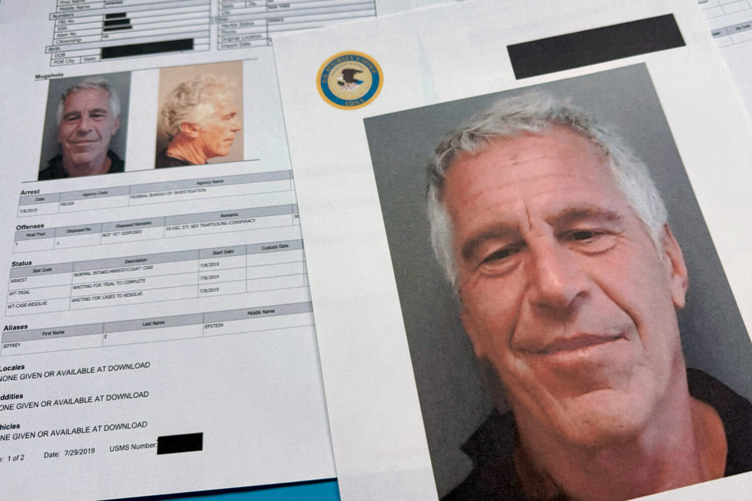 FILE - Documents that were included in the U.S. Department of Justice release of the Jeffrey Epstei...