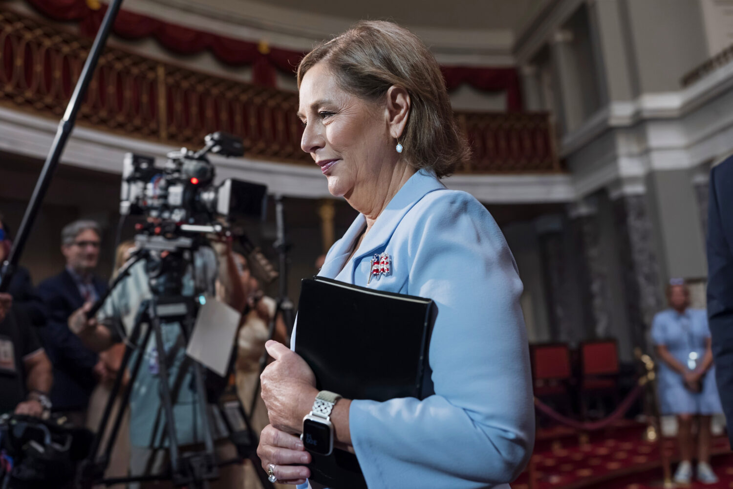 Newly-sworn Sen. Darline Graham, R-S.C., sister of Lindsey Graham, walks past cameras as she leaves...