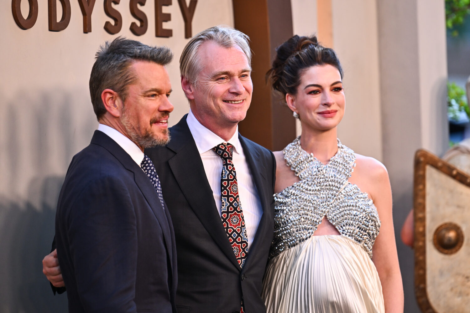 Matt Damon, from left, director Christopher Nolan, and Anne Hathaway attend the premiere of "The Od...