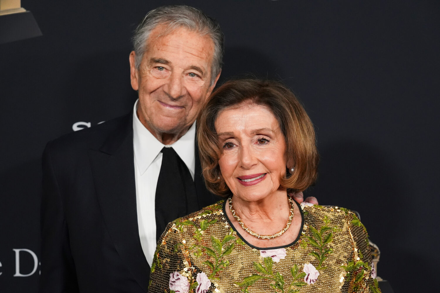FILE - Paul Pelosi, left, and Nancy Pelosi arrive at the Pre-Grammy Gala on Jan. 31, 2026, at the B...