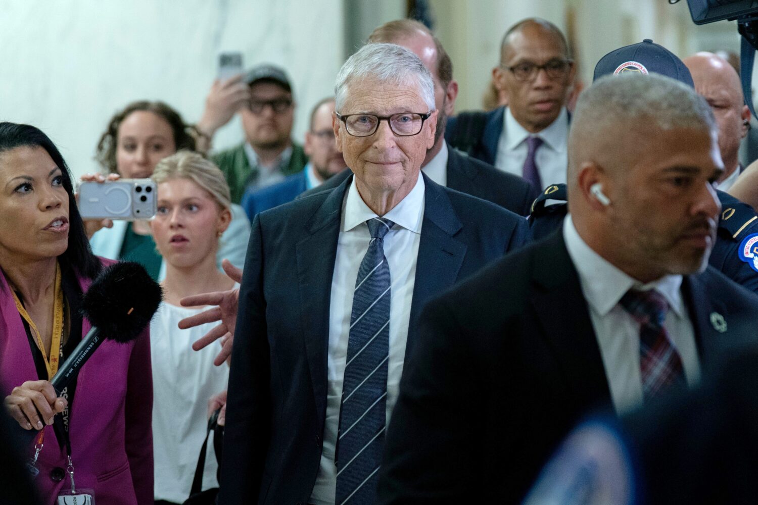 FILE - Bill Gates, co-founder of Microsoft, leaves after a closed-door interview with the House Ove...