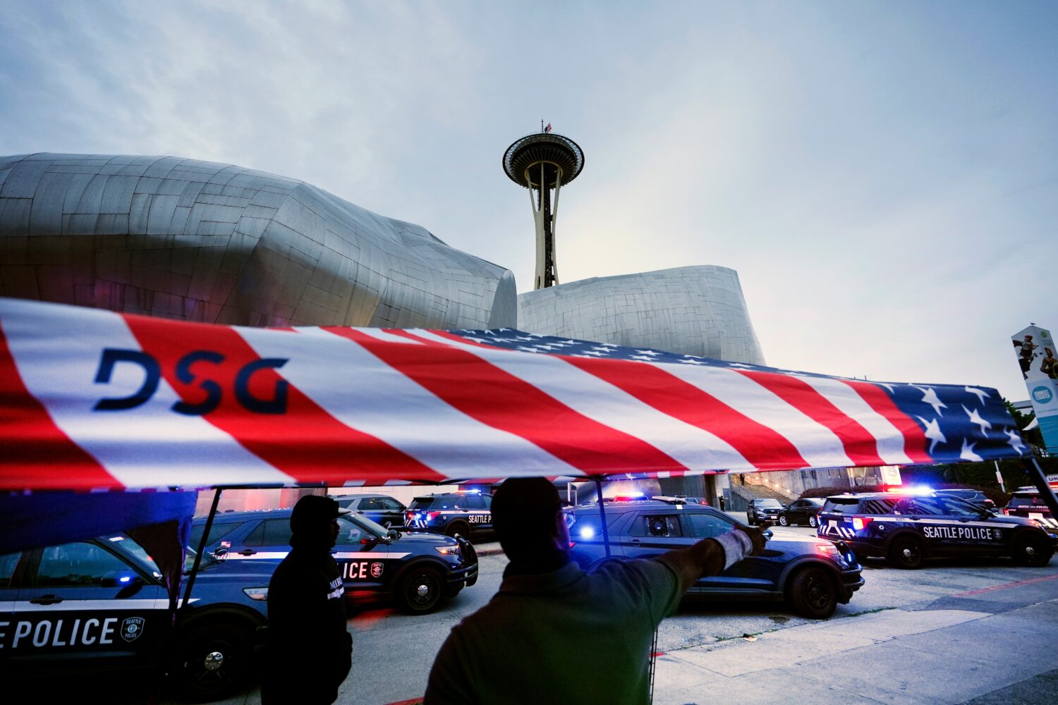 Police respond to a shooting at Seattle Center during the Bite of Seattle food festival Sunday, Jul...