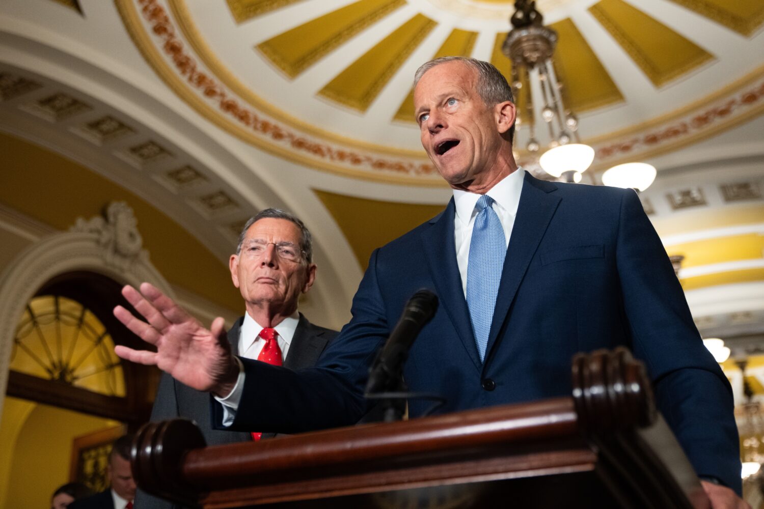Senate Majority Leader John Thune, R-S.D., speaks to reporters following a weekly policy luncheon a...