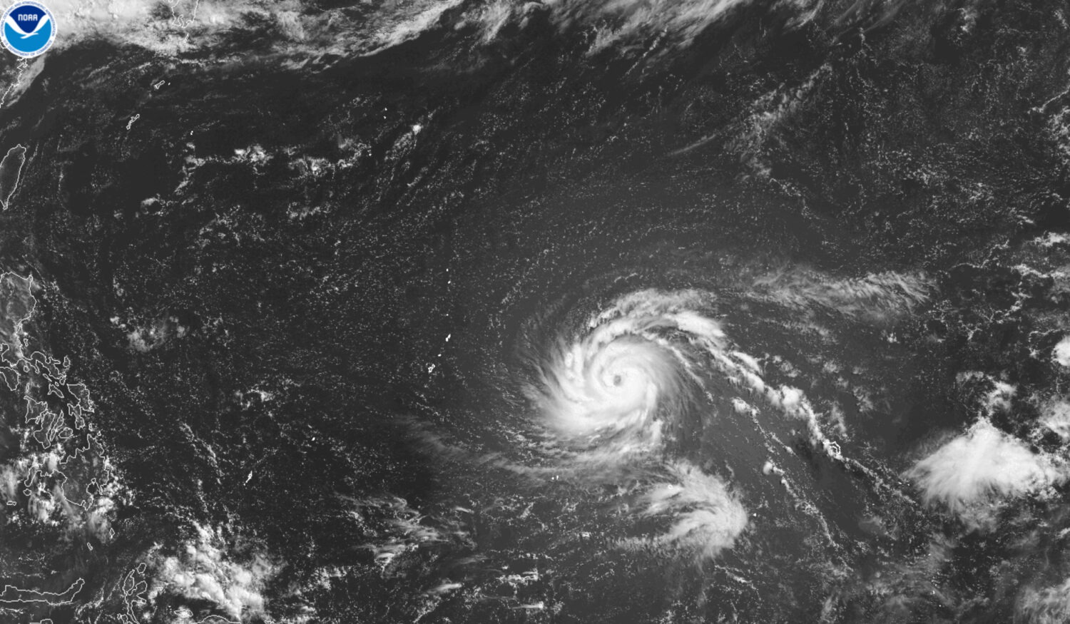 This satellite image from the National Oceanic and Atmospheric Administration shows Typhoon Bavi ea...