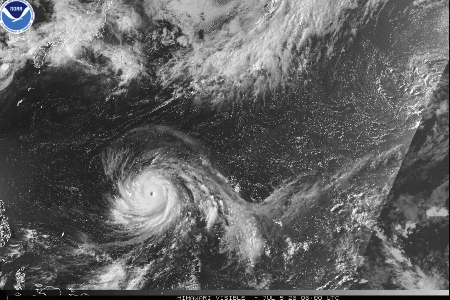 This satellite image from the National Oceanic and Atmospheric Administration shows Typhoon Bavi ne...