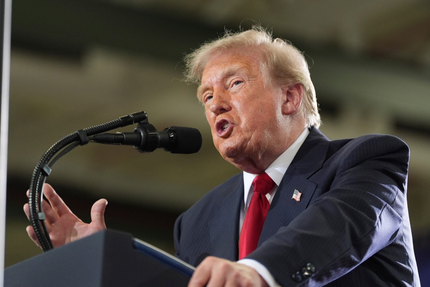 President Donald Trump speaks at General Motors proving ground, Monday, July 27, 2026, in Milford, ...