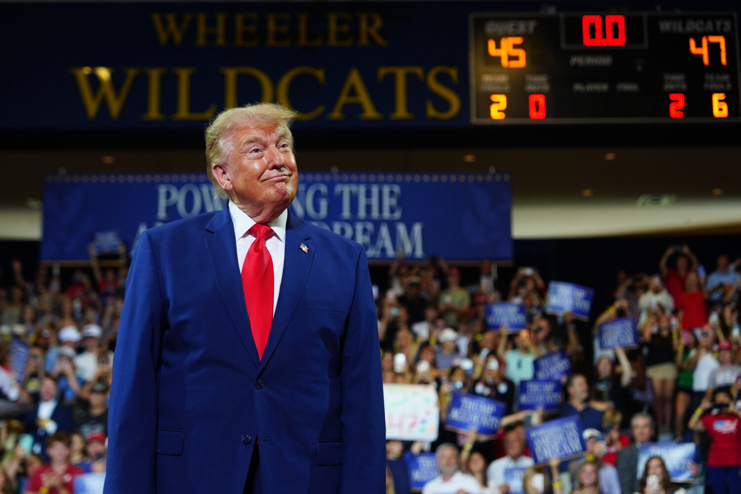 President Donald Trump appears on stage at Wheeler High School, Wednesday, July 22, 2026, in Mariet...