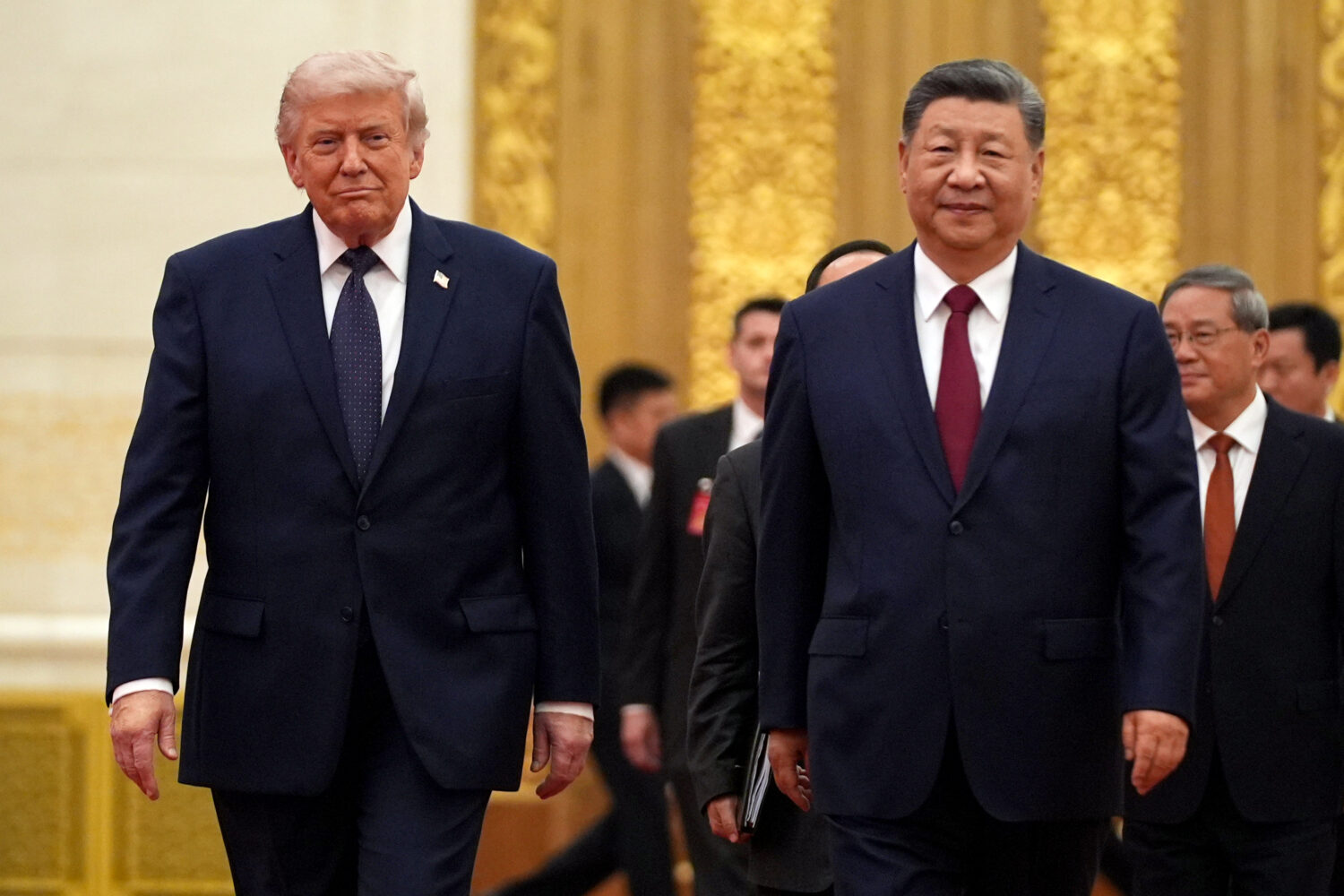 FILE - President Donald Trump, left, and Chinese President Xi Jinping arrive during a state dinner ...