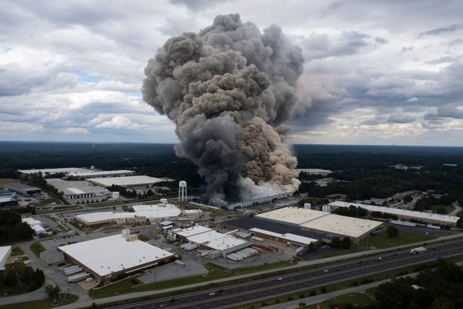 FILE - Smoke billows from a fire at the BioLab facility in Conyers, Ga., Sunday, Sept. 29, 2024. (B...