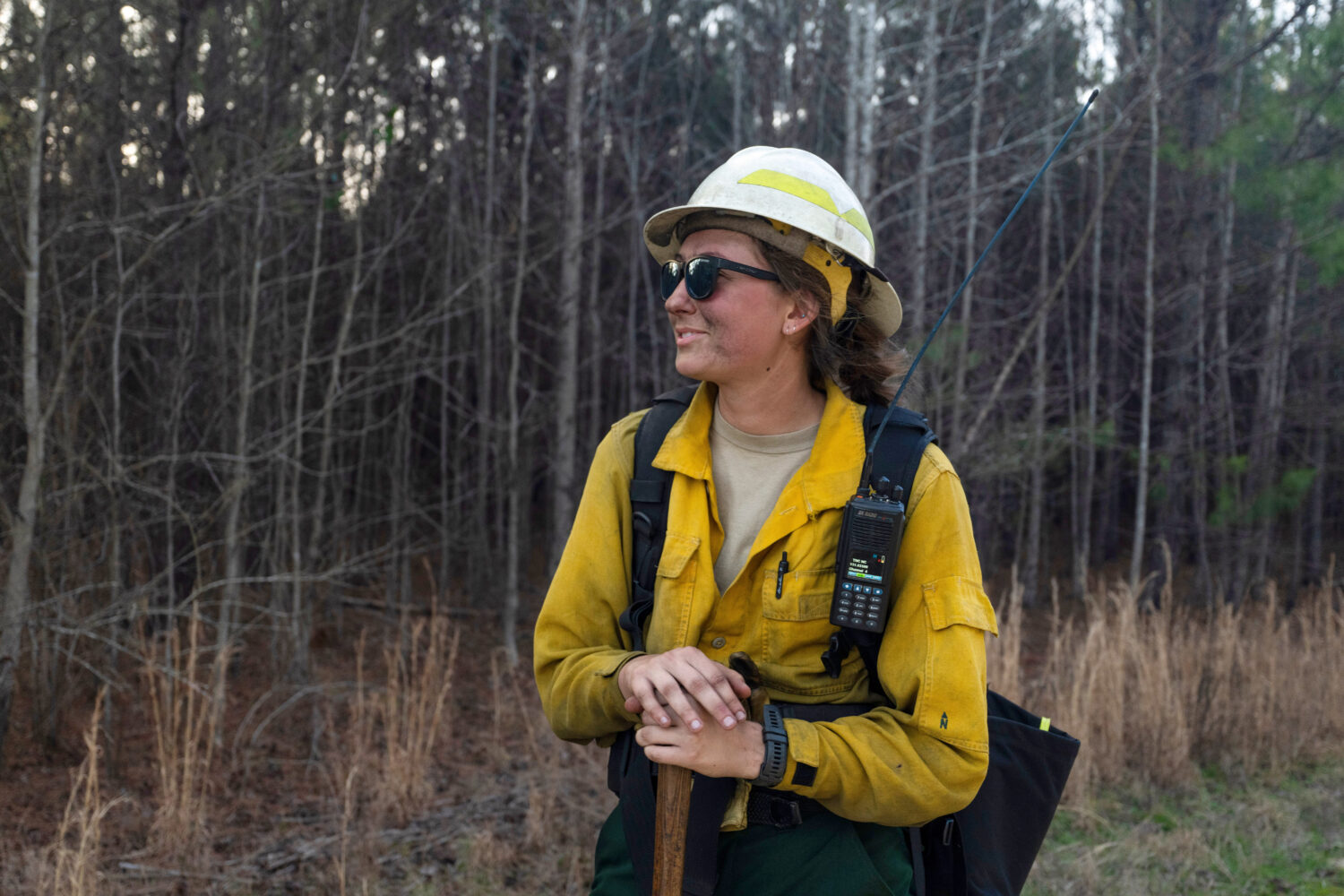 This photo provided by Holly Tuckett shows wildland firefighter Sydney Watson at the North Carolina...
