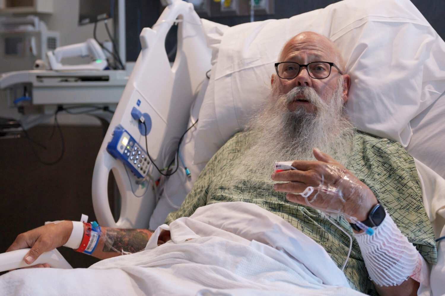 This image taken from Bozeman Health video shows Carl McDaniel speaking from in a hospital bed at B...