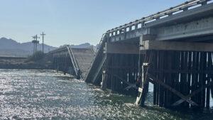 Fire damage suspected in collapse of bridge over Colorado River in western Arizona