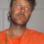 Arizona man accused of naked train surfing in Colorado