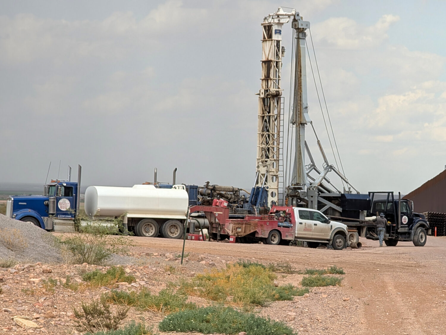 Construction crews drill wells for border wall construction in July 2026, in Luna County, N.M., alo...