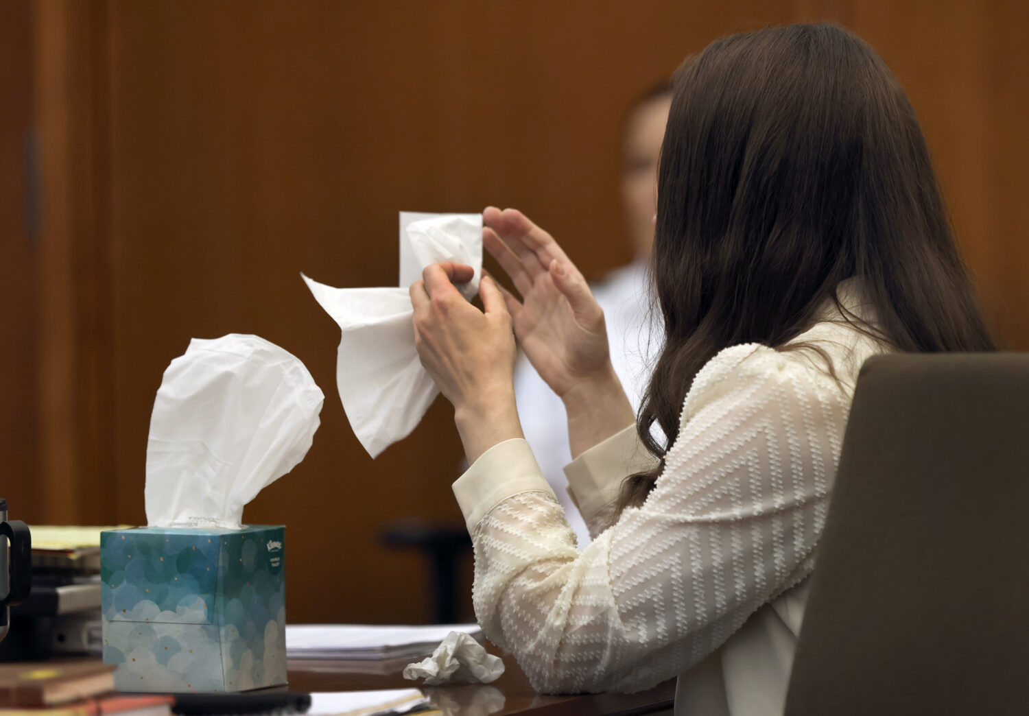 Lindsay Clancy grabs a tissue after witness Elaine Rossi, the nanny to the Clancy children, testifi...