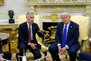 The Latest: Last-minute talks seek to stop US tariffs on Canadian goods