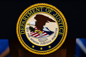 Fired federal prosecutor sues Justice Department