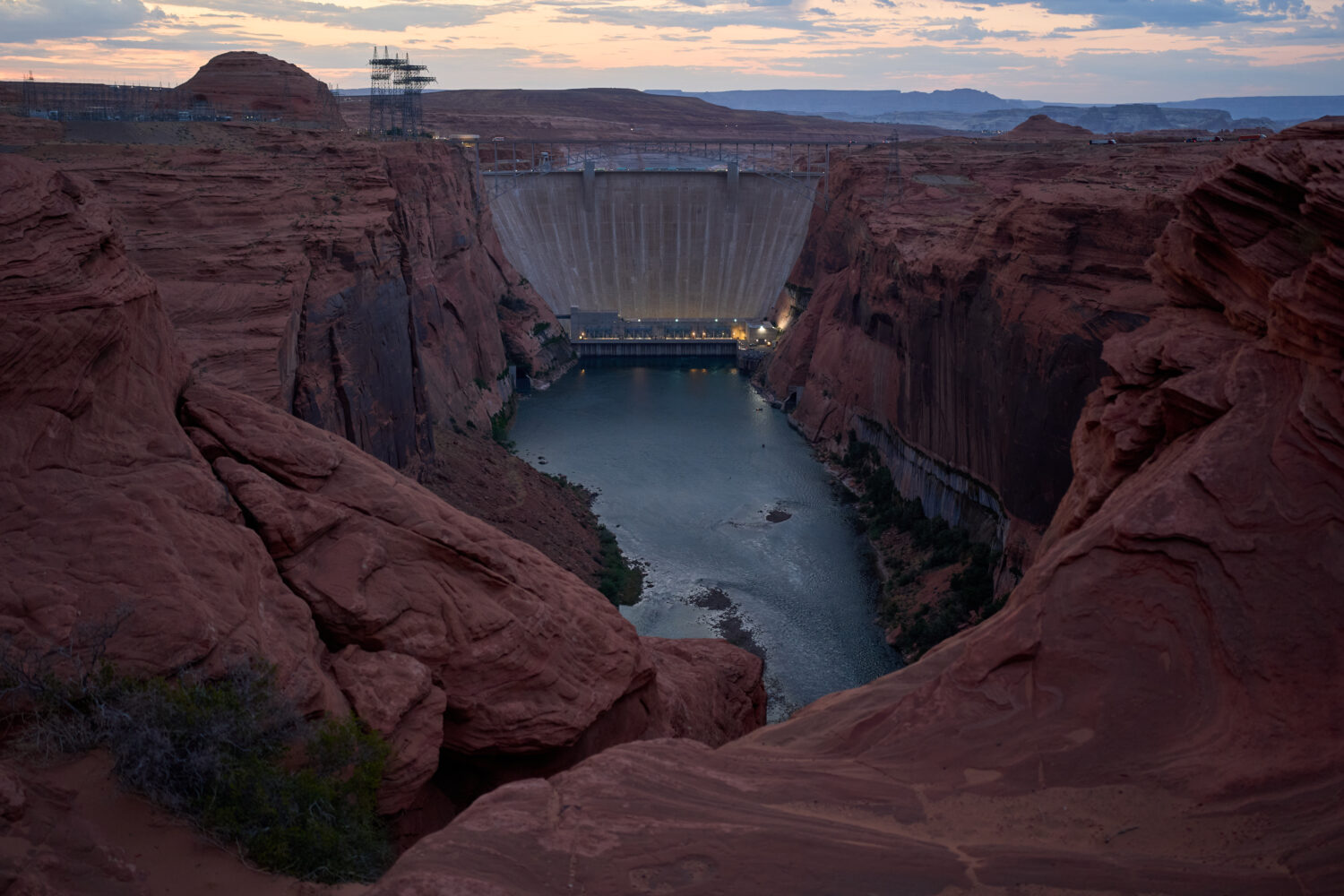 The Colorado River flows beneath the Glen Canyon Dam at the Glen Canyon National Recreation Area, T...