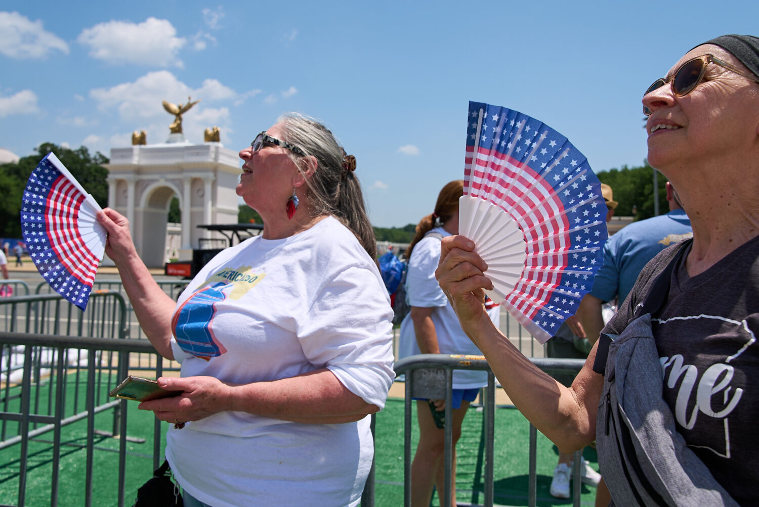 FILE - Mickelina Papotto, of Salem, Ore., left, and Lorie Odegaard, of Gaithersburg, Md., fan thems...