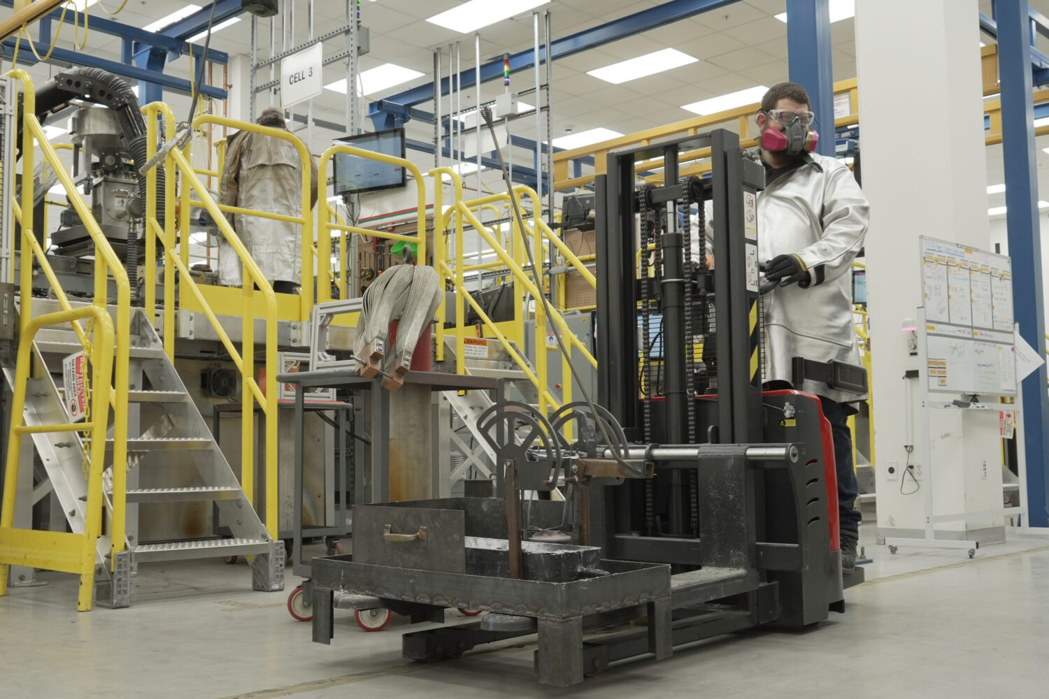 A worker drives a forklift at the Phoenix Tailings refinery Wednesday, July 22, 2026, in Exeter, N....