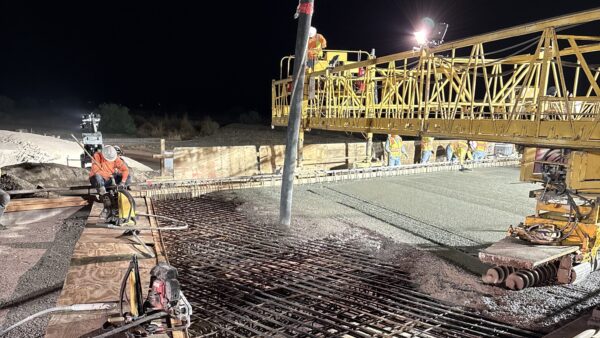 Workers recently completed the final concrete pour for the second half of the quarter-mile-long eastbound bridge deck.