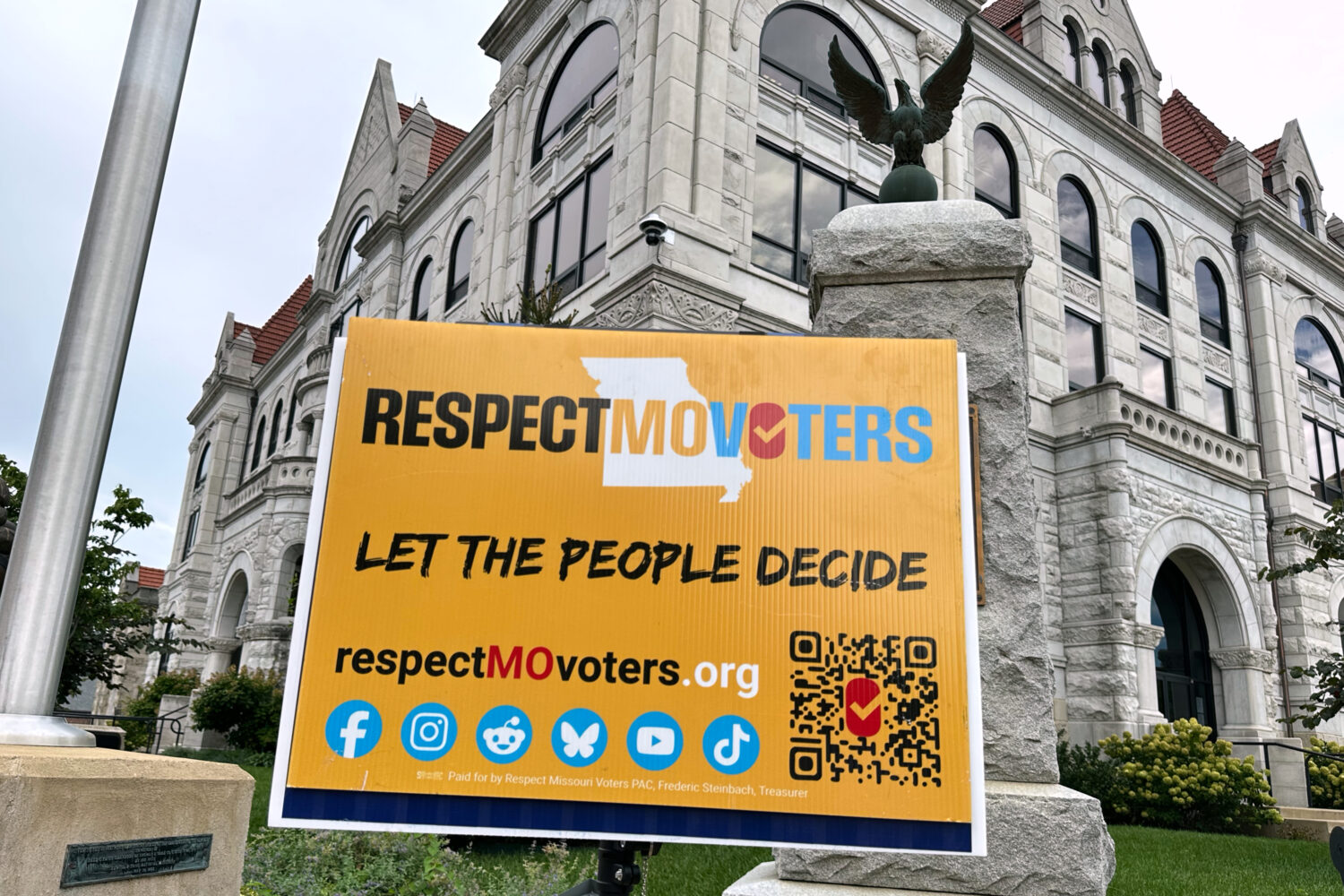 A sign in support of a proposed constitutional amendment backed by the group Respect Missouri Voter...