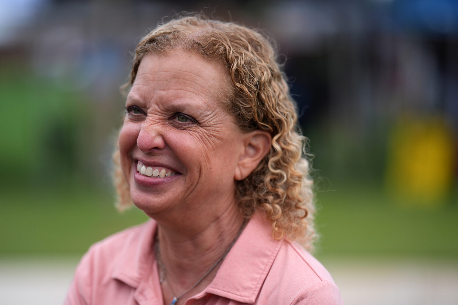 U.S. Rep. Debbie Wasserman Schultz smiles as she greets constituents at a National Night Out commun...