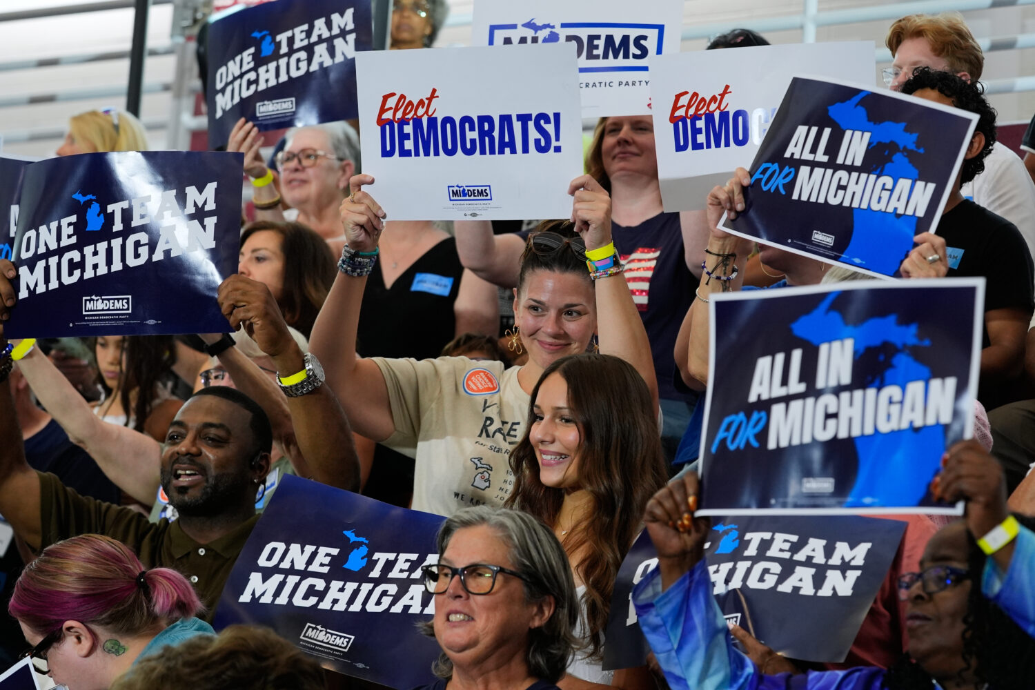 Supporters cheer at a Democratic General Election Kickoff Rally at Renaissance High School Friday, ...