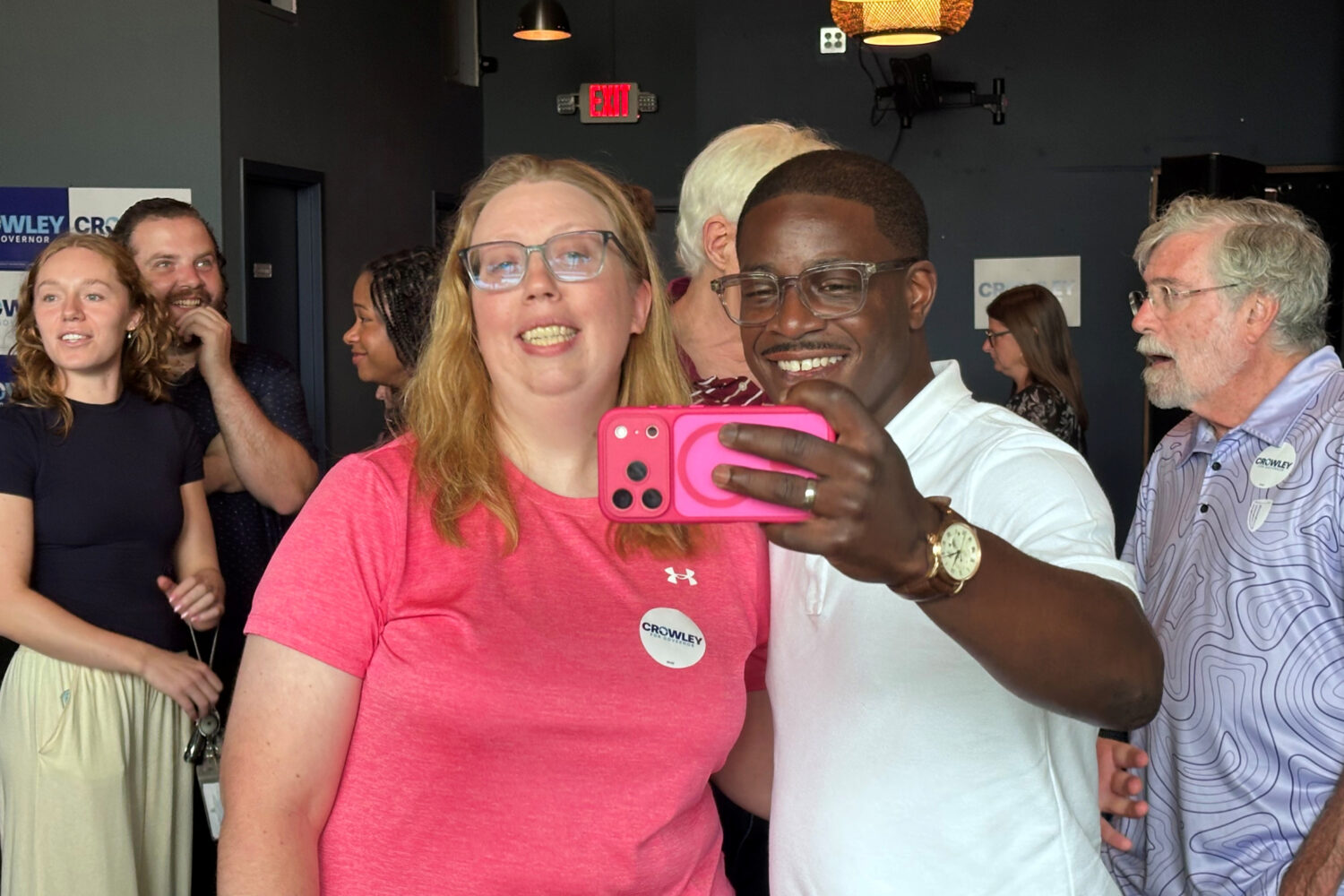 David Crowley, Democratic candidate for Wisconsin governor, takes a selfie photo with supporter Abi...