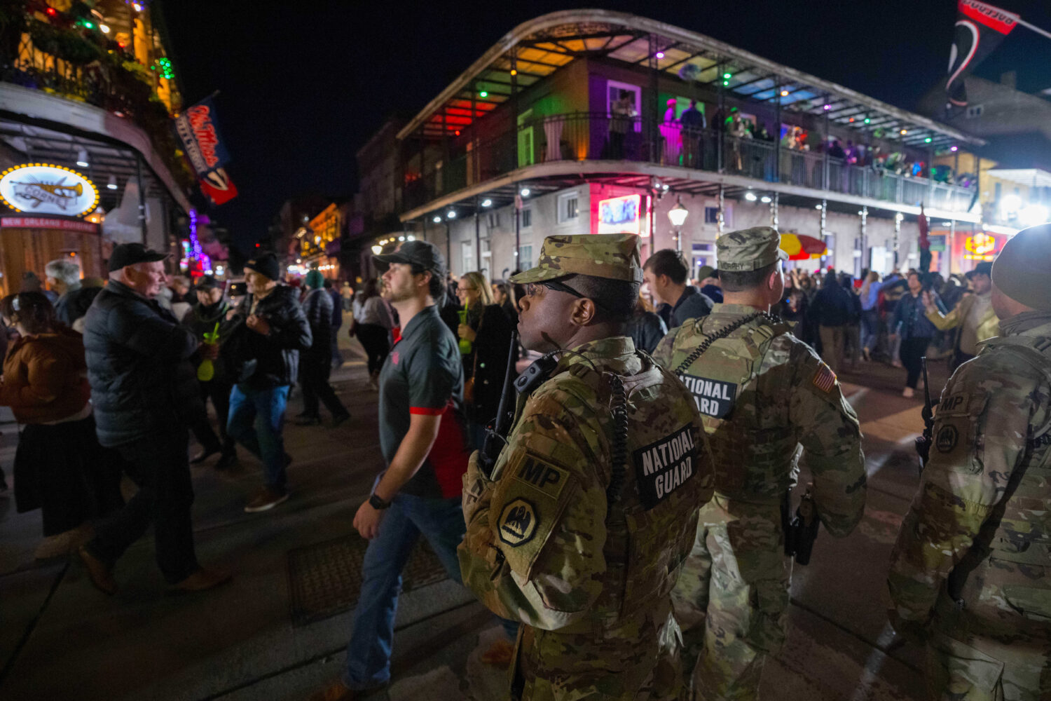 FILE - The National Guard and other uniformed members of law enforcement from federal, state, and l...