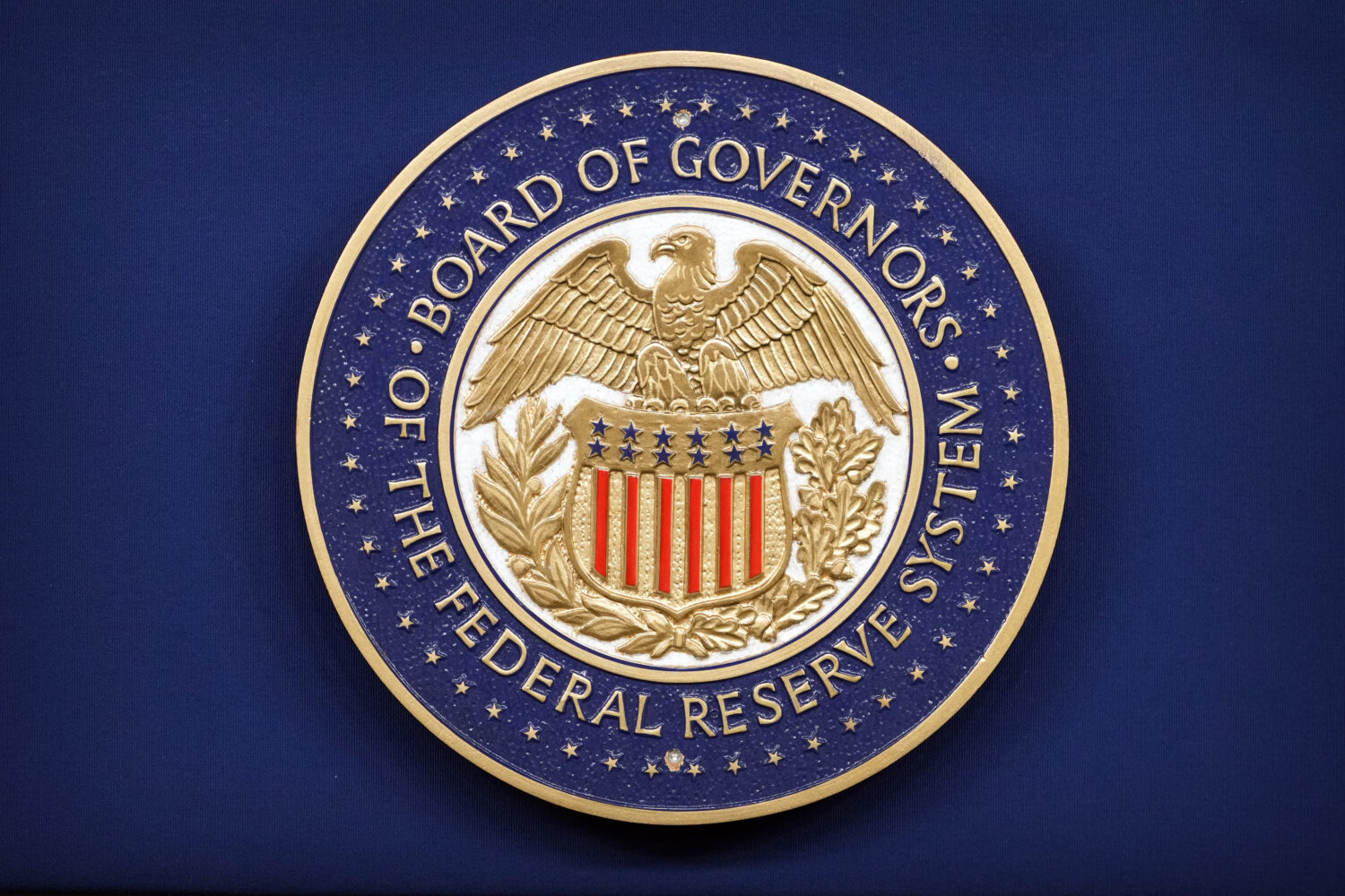The logo of the Federal Reserve Board of Governors is seen before a news conference with Federal Re...