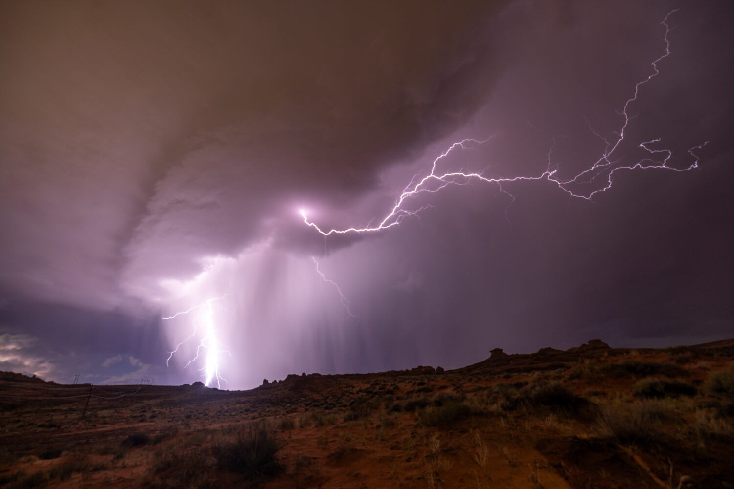FILE: Lightning strikes during a monsoon storm on Aug. 17, 2024. More storms could move into the Ph...