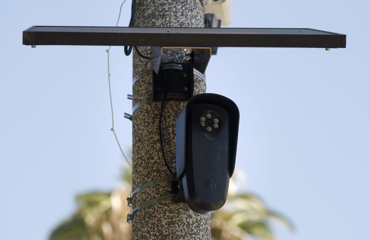 BEVERLY HILLS, CALIFORNIA - AUGUST 03: A Flock Safety camera is shown mounted to a light pole on Au...