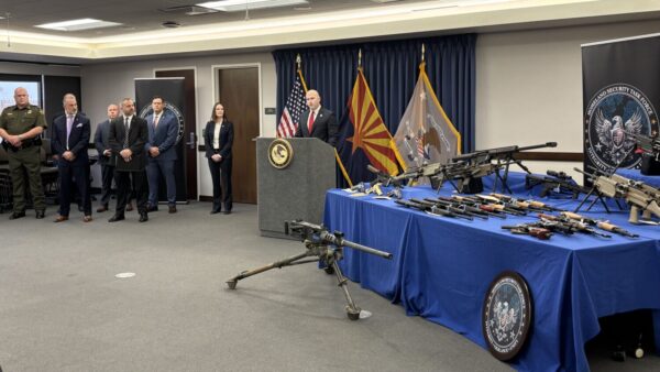 Prosecutors say a Phoenix man recruited straw buyers to purchase Glocks and AK-style rifles later destined for export outside the United States.