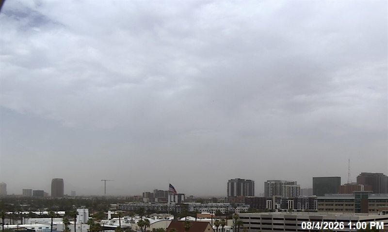 A wall of dust rolls across the Phoenix metro area Tuesday after overnight thunderstorms in souther...