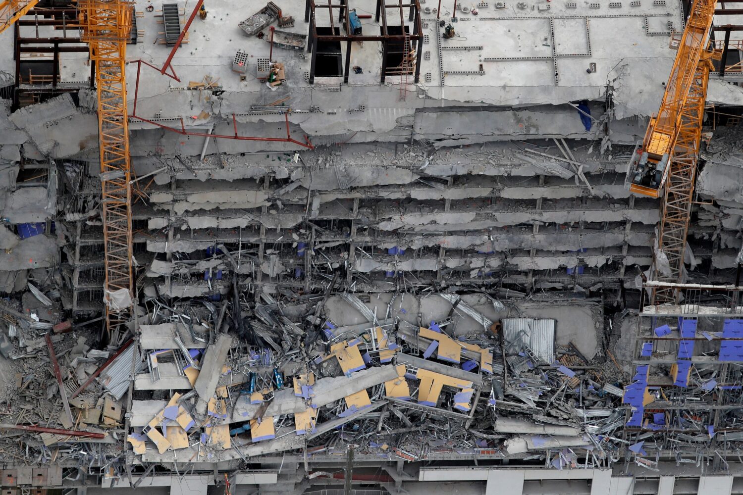 FILE - This aerial photo shows the Hard Rock Hotel, which was under construction, after a fatal par...