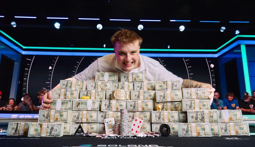 Lucas Jumalon displays the World Series of Poker gold bracelet after claiming the $10 million grand...
