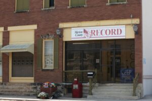 A Kansas town will pay $850K to end a reporter’s lawsuit over a 2023 raid on her paper’s offices