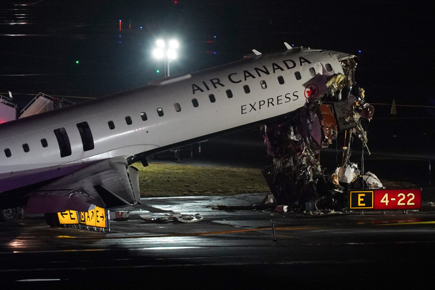 FILE - An Air Canada Jet sits on the runway at LaGuardia Airport, Monday, March 23, 2026, after col...