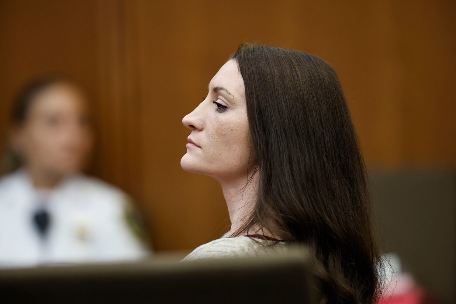 Lindsay Clancy listens to testimony during her murder trial in Plymouth Superior Court, on Wednesda...