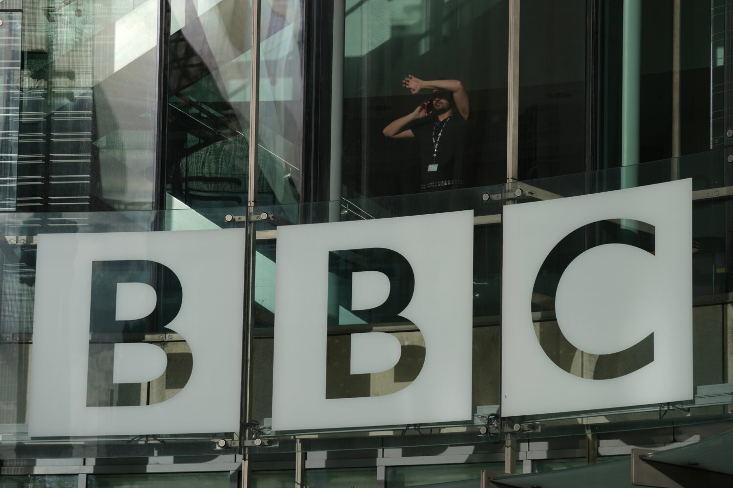 FILE - The BBC logo is displayed at its headquarters in London, Nov. 12, 2025. (AP Photo/Kin Cheung...