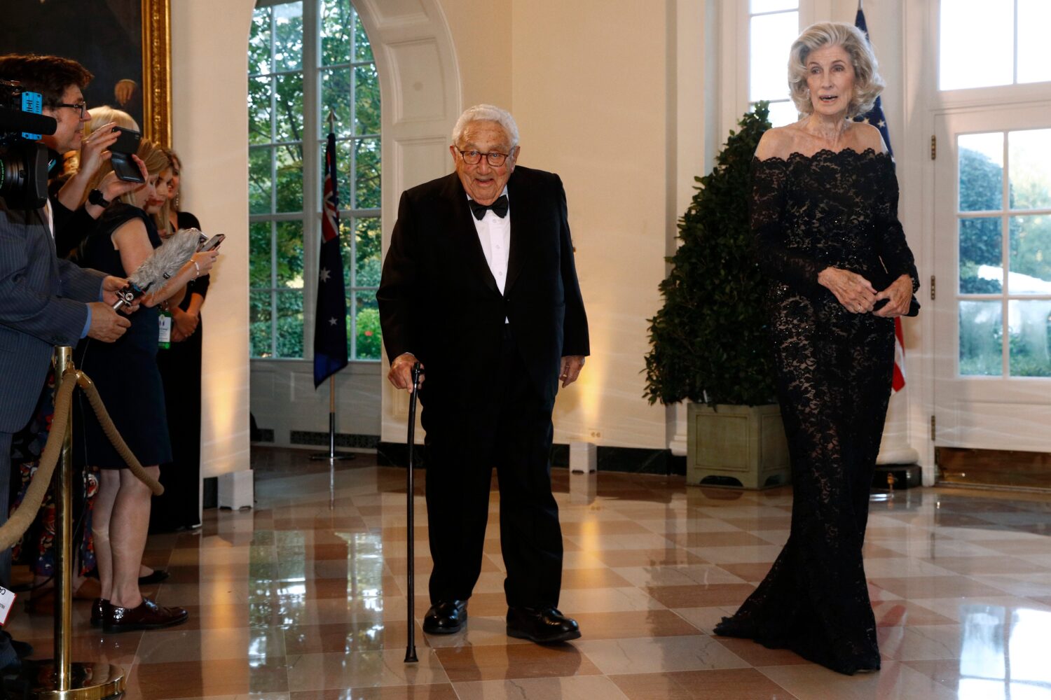 FILE - Former Secretary of State Henry Kissinger, left, and wife Nancy Kissinger arrive for a State...