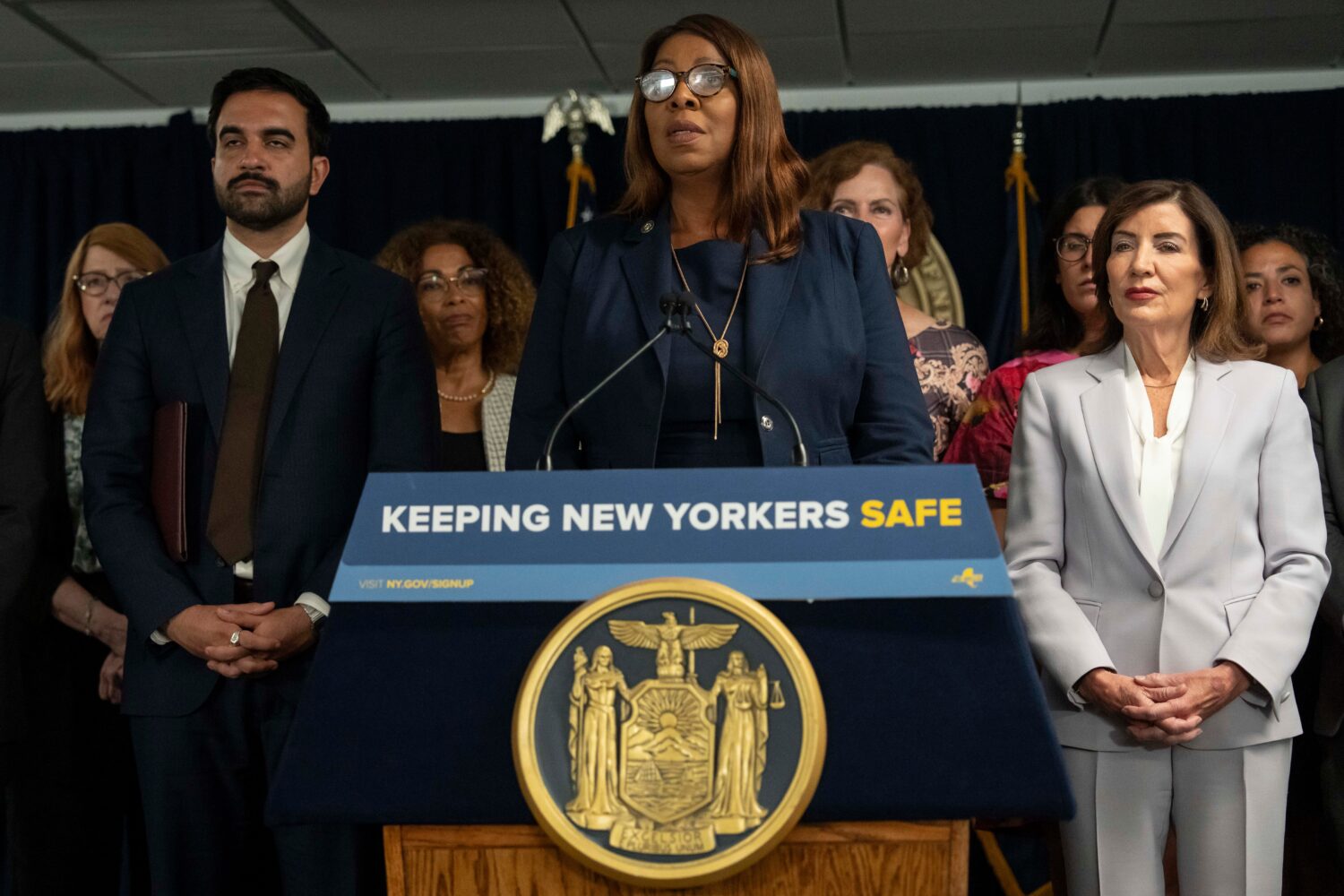 New York Attorney General Letitia James, flanked by New York Mayor Zohran Mamdani, left, and New Yo...