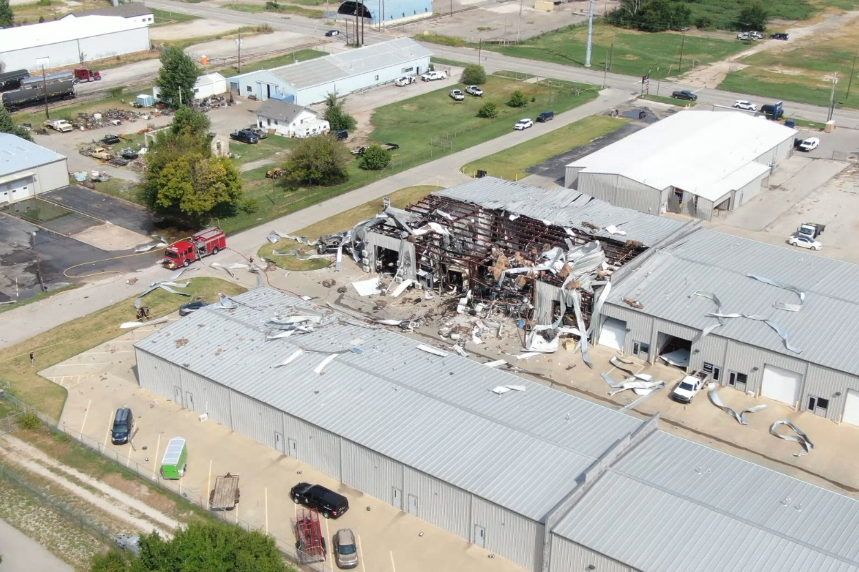 In this image taken from video provided by KFOR, authorities work the scene of a building explosion...