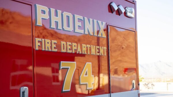 Two people were hospitalized Friday afternoon following a three-vehicle crash in north Phoenix, including a man who was in critical condition, authorities said.