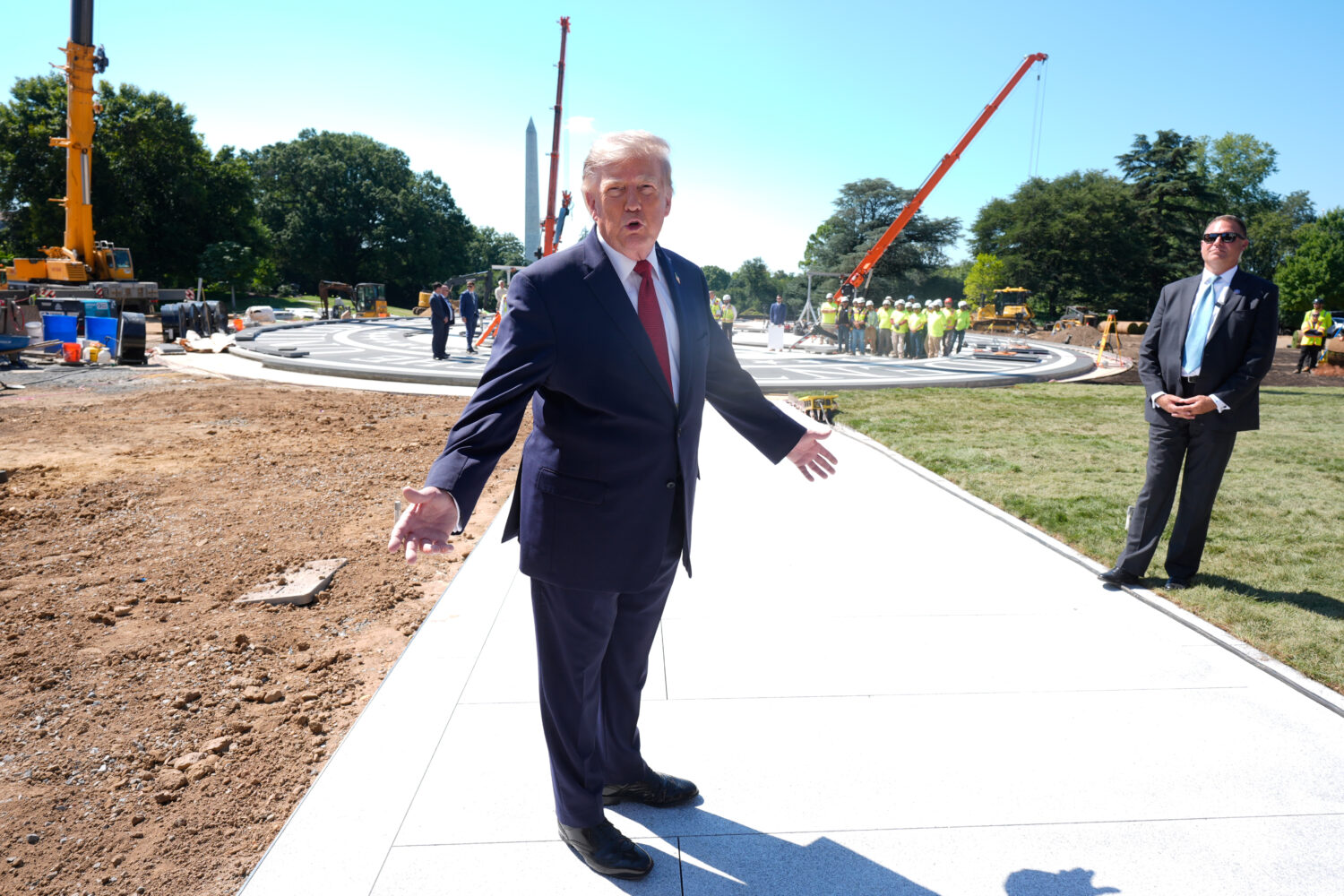 President Donald Trump speaks outside the White House, Wednesday, Aug. 19, 2026, in Washington, nea...