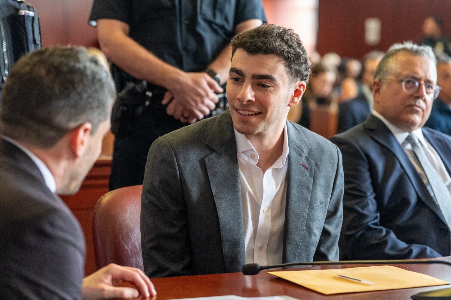 Luigi Mangione appears for a pre-trial hearing at Manhattan Criminal Court in New York, on Tuesday,...