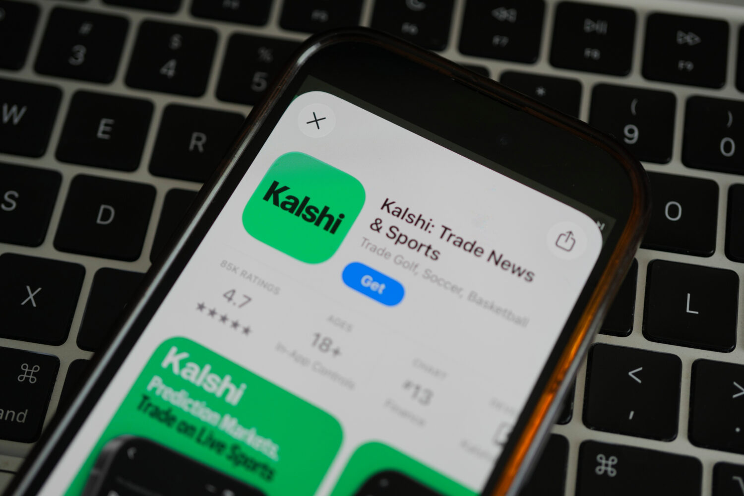 FILE - An ad for the prediction market app Kalshi is displayed on a mobile phone Thursday, April 16...