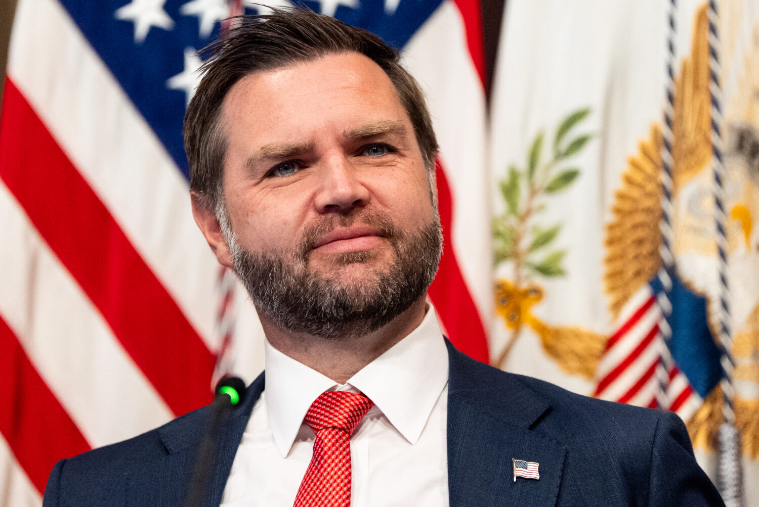 Vice President JD Vance smiles during a roundtable event in the Eisenhower Executive Office Buildin...